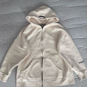 FEAR OF GOD ESSENTIALS CREAM ZIP UP HOODIE